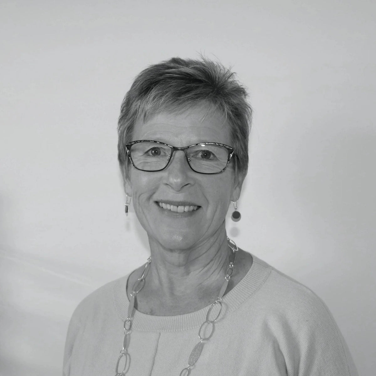 A black and white artist profile photo of Cate Lowry, Tasmanian contemporary jewellery artist.