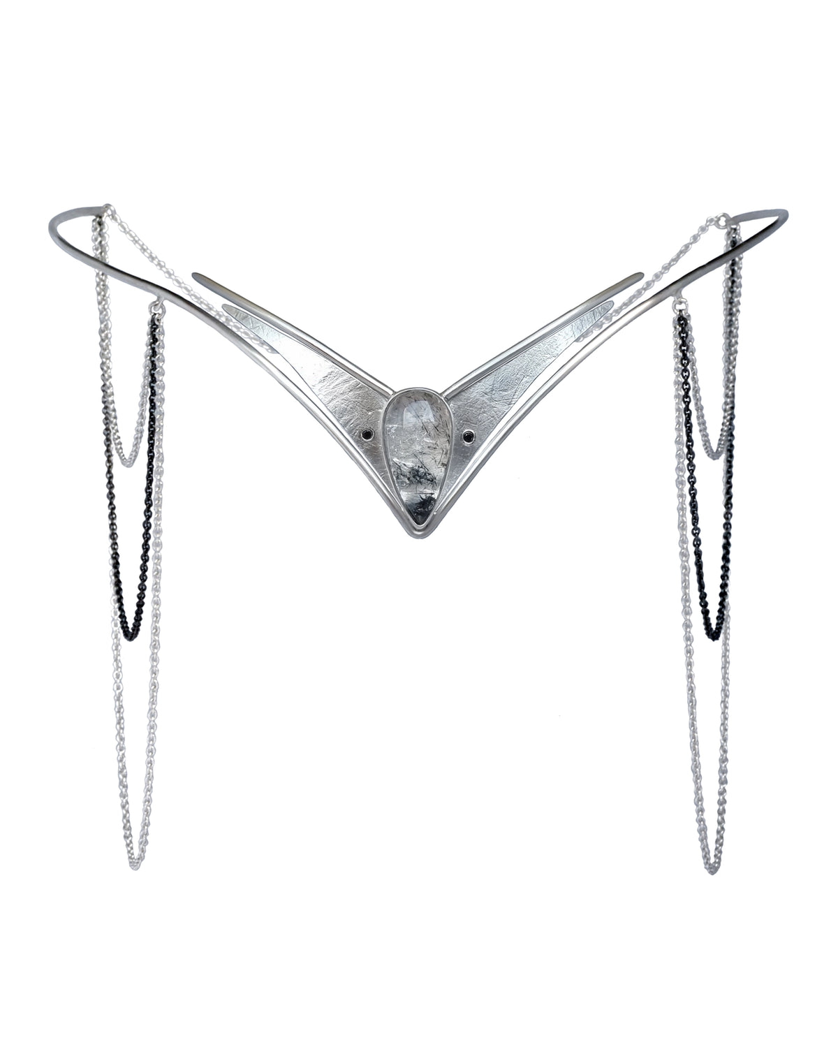 A sterling silver sculptural diadem tiara with a central rutile quartz gemstone, and two long dangling chain strands on each side, shown against a plain white background. Handmade by Emily Eliza Arlotte in Hobart, Tasmania.