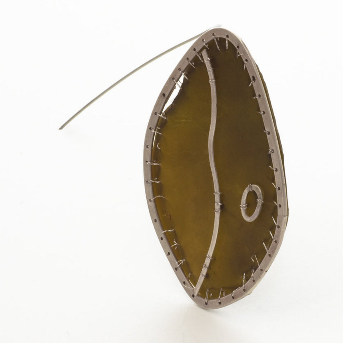 Topology Brooch by Karin Beaumont on a white background.
