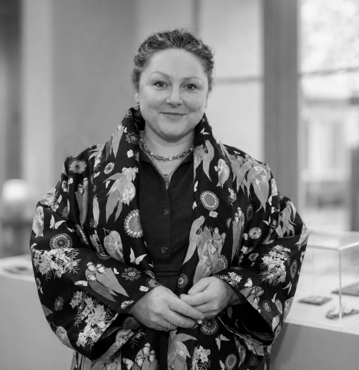 A black and white portrait of artist and jeweller, Shauna Mayben, from Tasmania.
